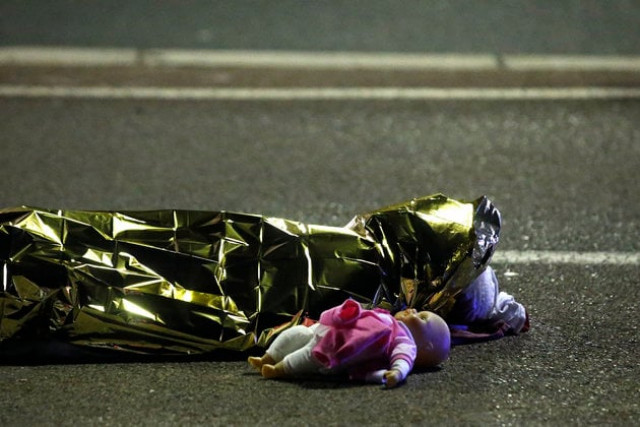 a body is seen on the ground july 15 2016 after at least 30 people were killed in nice france when a truck ran into a crowd celebrating the bastille day national holiday july 14 photo reuters a body is seen on the ground july 15 2016 after at least 30 people were killed in nice france when a truck ran into a crowd celebrating the bastille day national holiday july 14 photo reuters