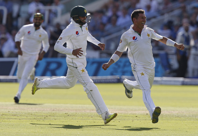 pakistan 039 s yasir shah r celebrates taking the wicket of england 039 s chris woakes for 23 runs caught out by pakistan 039 s younis khan on the fourth day of the first test cricket match between england and pakistan at lord 039 s cricket ground in london on july 17 2016 photo afp pakistan 039 s yasir shah r celebrates taking the wicket of england 039 s chris woakes for 23 runs caught out by pakistan 039 s younis khan on the fourth day of the first test cricket match between england and pakistan at lord 039 s cricket ground in london on july 17 2016 photo afp