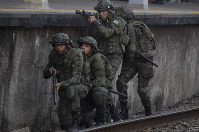 brazilian army special forces assigned to the security of the rio 2016 olympics games train along the platforms of the deodoro train station in rio de janeiro brazil on july 16 2016 photo afp brazilian army special forces assigned to the security of the rio 2016 olympics games train along the platforms of the deodoro train station in rio de janeiro brazil on july 16 2016 photo afp
