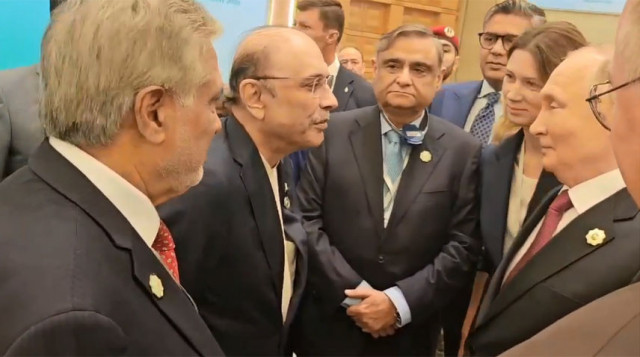 president zardari meets russia s putin during turkmenistan forum president zardari meets russia s putin during turkmenistan forum