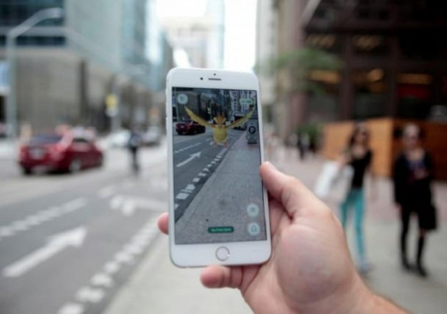 pokemon go mobile app nintendo 039 s new scavenger hunt game which utilizes geo positioning photo reuters