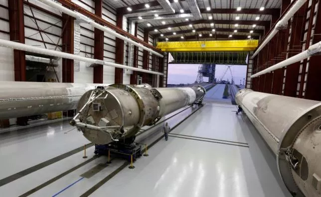 recovered first stages of three spacex falcon 9 rocket are shown during a photo opportunity in the spacex hangar at launch pad 39a photo reuters recovered first stages of three spacex falcon 9 rocket are shown during a photo opportunity in the spacex hangar at launch pad 39a photo reuters