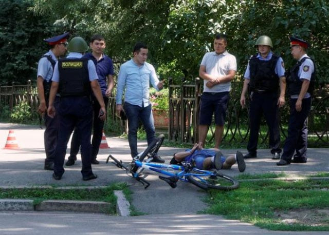 police officers detain a man after an attack in the centre of almaty kazakhstan july 18 2016 photo reuters police officers detain a man after an attack in the centre of almaty kazakhstan july 18 2016 photo reuters