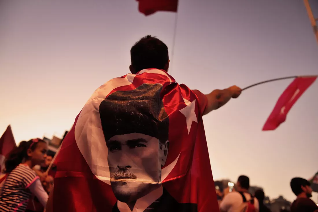 a boy is wrapped in a flag of the founder of modern turkey mustafa kemal ataturk on taksim square on july 17 2016 following a failed coup attempt photo afp a boy is wrapped in a flag of the founder of modern turkey mustafa kemal ataturk on taksim square on july 17 2016 following a failed coup attempt photo afp
