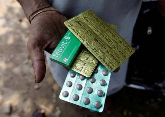 a tuberculosis patient holds his medicines received from the government 039 s tuberculosis center in rawalpindi pakistan july 11 2016 picture taken july 11 2016 photo reuters