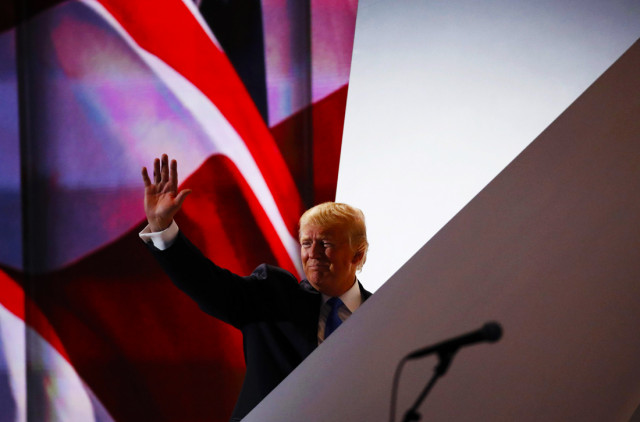 republican presidential candidate donald trump waves after his wife melania delivered her speech at the republican national convention in cleveland ohio us july 18 2016 photo reuters