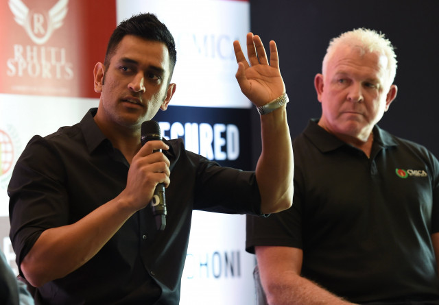 former australian cricketer craig mcdermott r watches as indian cricketer mahendra singh dhoni speaks during a promotional event in new delhi on july 20 2016 photo afp former australian cricketer craig mcdermott r watches as indian cricketer mahendra singh dhoni speaks during a promotional event in new delhi on july 20 2016 photo afp