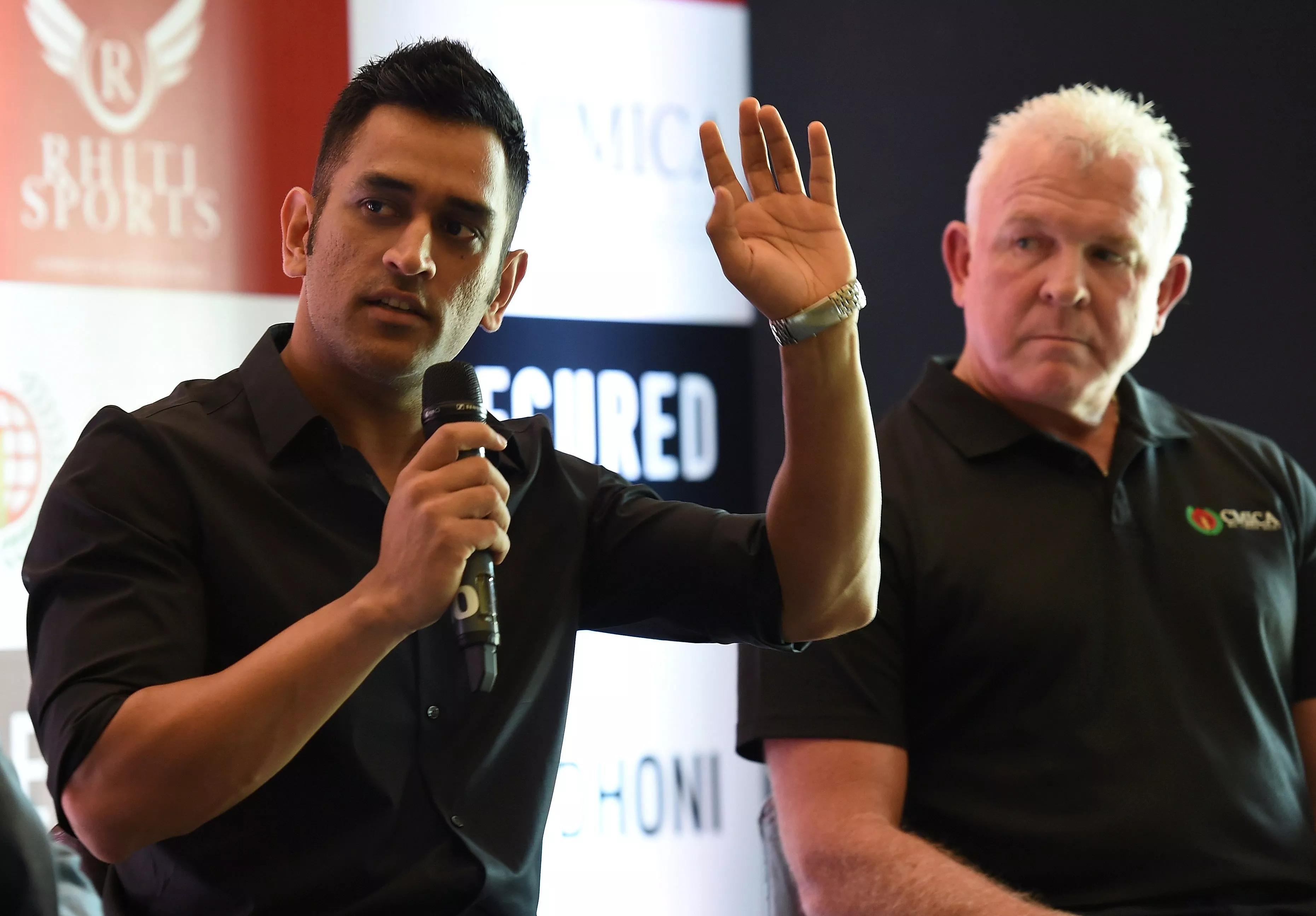 former australian cricketer craig mcdermott r watches as indian cricketer mahendra singh dhoni speaks during a promotional event in new delhi on july 20 2016 photo afp former australian cricketer craig mcdermott r watches as indian cricketer mahendra singh dhoni speaks during a promotional event in new delhi on july 20 2016 photo afp