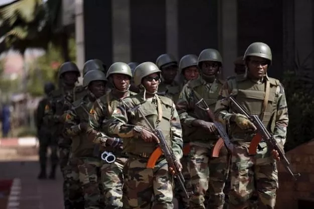 soldiers patrol outside the radisson hotel in bamako mali photo reuters soldiers patrol outside the radisson hotel in bamako mali photo reuters