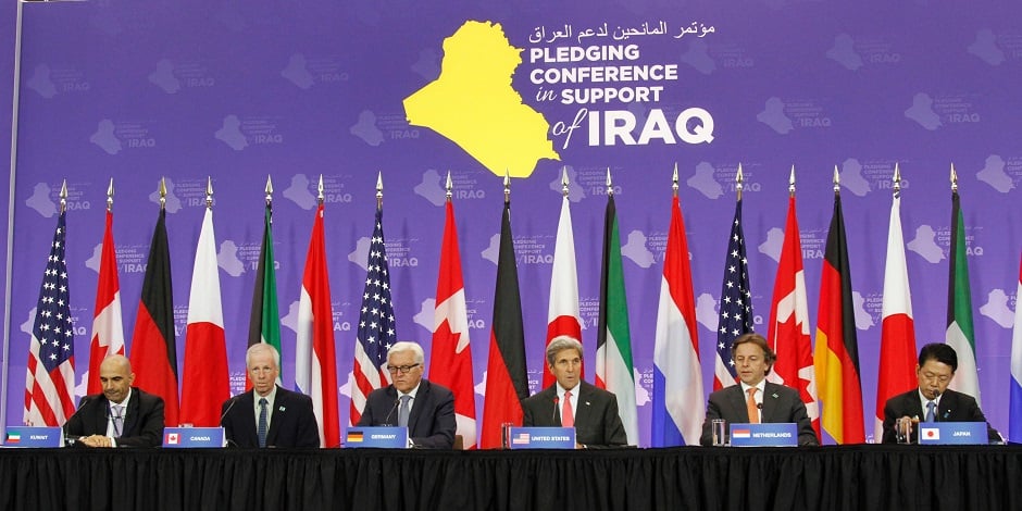 us secretary of state john kerry and other leaders take part in a press conference after the pledging conference in support of iraq photo afp