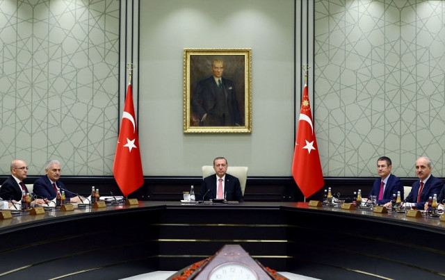 turkish president tayyip erdogan deputy prime ministers mehmet simsek numan kurtulmus chairs a cabinet meeting at the presidential palace in ankara photo reuters turkish president tayyip erdogan deputy prime ministers mehmet simsek numan kurtulmus chairs a cabinet meeting at the presidential palace in ankara photo reuters
