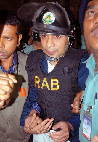 bangladeshi policemen as they escort tarique rahman photo afp bangladeshi policemen as they escort tarique rahman photo afp