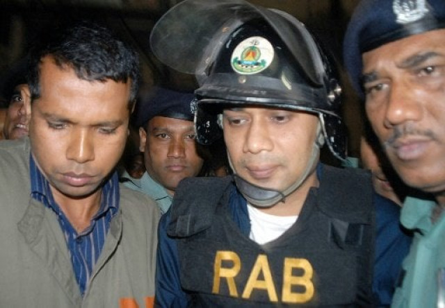 bangladeshi policemen escort tarique rahman c to court in dhaka in march 2007 photo afp bangladeshi policemen escort tarique rahman c to court in dhaka in march 2007 photo afp