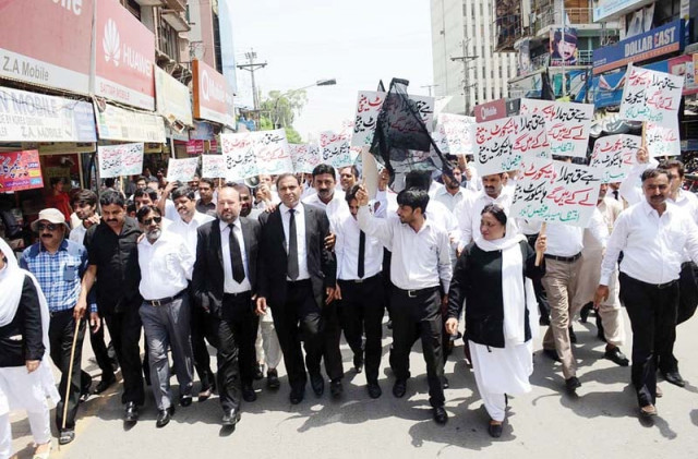 members of the faisalabad dba at the demonstration on thursday photo wires members of the faisalabad dba at the demonstration on thursday photo wires