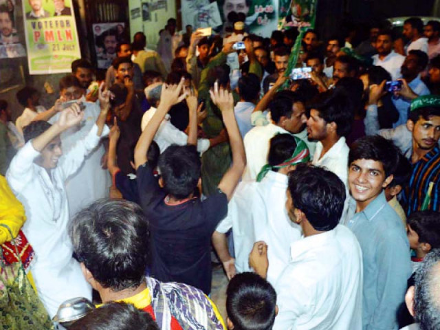 a group of muslim league n supporters are ecstatic at the result in a constituency in ajk which went in their favour photo zafar aslam express