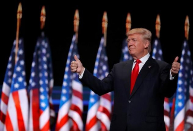 republican us presidential nominee donald trump gives two thumbs up as he arrives to speak during the final session at the republican national convention in cleveland ohio us photo reuters republican us presidential nominee donald trump gives two thumbs up as he arrives to speak during the final session at the republican national convention in cleveland ohio us photo reuters