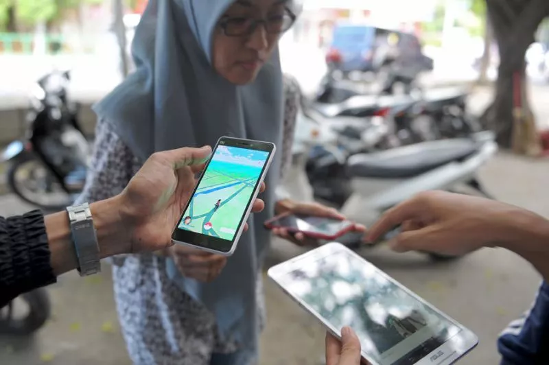 indonesians playing pokemon go on the streets in banda aceh photo afp indonesians playing pokemon go on the streets in banda aceh photo afp