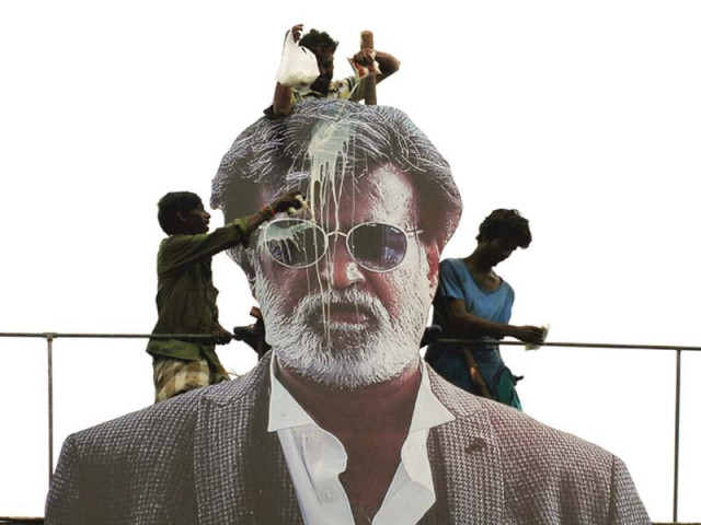 rajinikanth s posters were bathed in milk in chennai photo afp