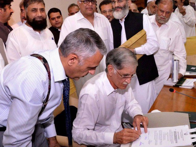 khyber pakhtunkhwa chief minister pervez khattak signs the budget document for fiscal year 2016 17 khyber pakhtunkhwa chief minister pervez khattak signs the budget document for fiscal year 2016 17