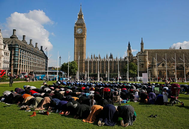 muslims take part in friday prayers during a muslim climate action mca event at parliament square in central london photo reuters