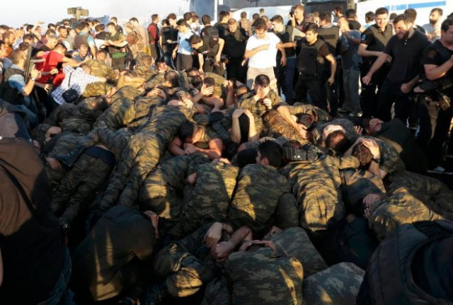 surrendered turkish soldiers who were involved in the coup are surrounded by people on bosphorus bridge in istanbul turkey july 16 2016 photo reuters surrendered turkish soldiers who were involved in the coup are surrounded by people on bosphorus bridge in istanbul turkey july 16 2016 photo reuters