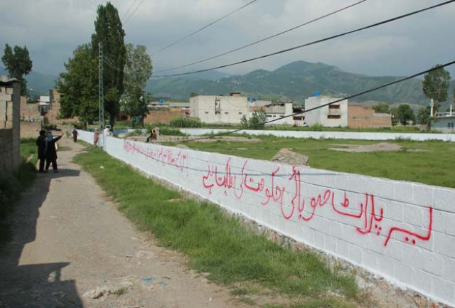 workers mark the edges of the patch of ground where the house where al qaeda leader osama bin laden was killed once stood in abbottabad on july 23 2016 photo afp workers mark the edges of the patch of ground where the house where al qaeda leader osama bin laden was killed once stood in abbottabad on july 23 2016 photo afp