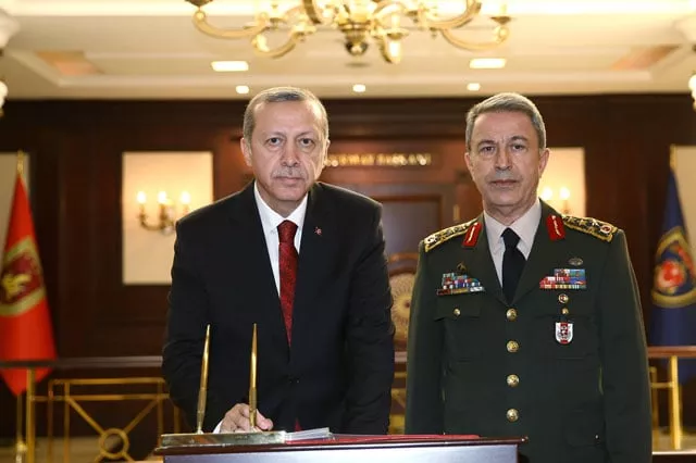 this handout picture released by turkish prime minister press office on february 18 2016 shows turkish president recep tayyip erdogan l delivering a speech as chief of the general staff of the turkish armed forces as hulusi akar r stands next to him during his condolence visit at the general staff headquarters in ankara photo afp this handout picture released by turkish prime minister press office on february 18 2016 shows turkish president recep tayyip erdogan l delivering a speech as chief of the general staff of the turkish armed forces as hulusi akar r stands next to him during his condolence visit at the general staff headquarters in ankara photo afp