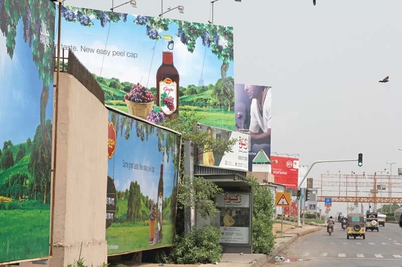 a large number of billboards are still present on karsaz road photo aysha saleem express