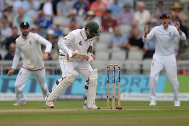asad shafiq almost plays a shot onto his stumps at old trafford cricket ground in manchester england on july 24 2016 photo afp asad shafiq almost plays a shot onto his stumps at old trafford cricket ground in manchester england on july 24 2016 photo afp