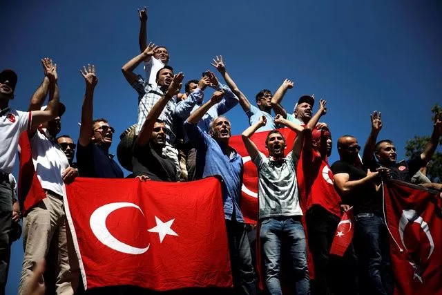 supporters of turkish president tayyip erdogan shout slogans and wave turkish flags during a pro government demonstration in istanbul turkey july 19 2016 photo reuters supporters of turkish president tayyip erdogan shout slogans and wave turkish flags during a pro government demonstration in istanbul turkey july 19 2016 photo reuters