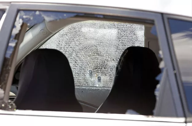 a car hit by gunfire sits outside of club blu where two people were killed and at least 15 wounded on july 25 2016 in fort myers florida photo afp a car hit by gunfire sits outside of club blu where two people were killed and at least 15 wounded on july 25 2016 in fort myers florida photo afp
