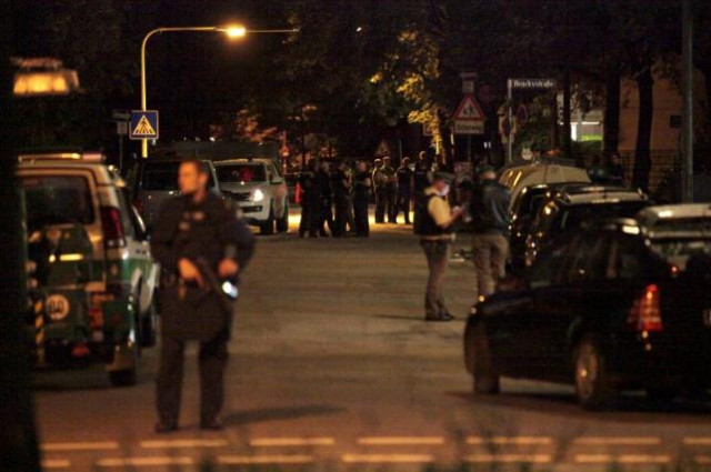 police stand in a small street following a shooting rampage at the olympia shopping mall in munich germany july 22 2016 photo reuters police stand in a small street following a shooting rampage at the olympia shopping mall in munich germany july 22 2016 photo reuters