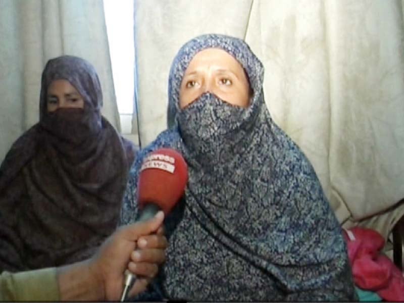 lady health workers speaking to the media about finding threatening notes pinned to the doors early on monday photo express