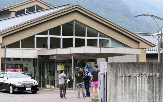a police officer is seen in a facility for the disabled where a knife wielding man attacked in sagamihara kanagawa prefecture japan in this photo taken by kyodo july 26 2016 photo reuters a police officer is seen in a facility for the disabled where a knife wielding man attacked in sagamihara kanagawa prefecture japan in this photo taken by kyodo july 26 2016 photo reuters