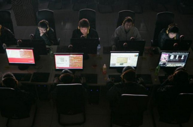 customers use computers at an internet cafe in taiyuan shanxi province photo reuters customers use computers at an internet cafe in taiyuan shanxi province photo reuters
