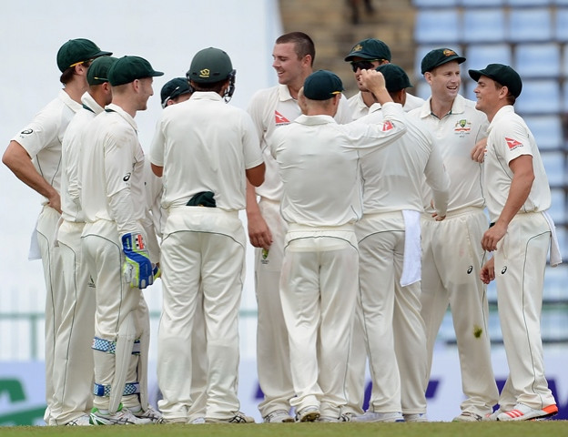 josh hazlewood c celebrates with teammates at the pallekele international cricket stadium in pallekele on july 26 2016 photo afp josh hazlewood c celebrates with teammates at the pallekele international cricket stadium in pallekele on july 26 2016 photo afp