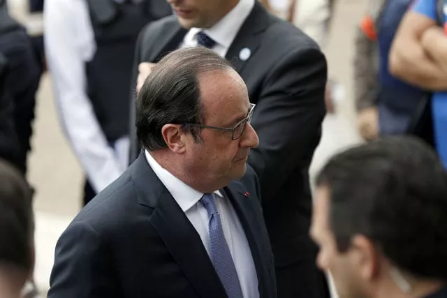 french president francois hollande stands outside the saint etienne du rouvray 039 s city hall after holding a press conference following a hostage taking at a church of the town on july 26 2016 photo afp french president francois hollande stands outside the saint etienne du rouvray 039 s city hall after holding a press conference following a hostage taking at a church of the town on july 26 2016 photo afp
