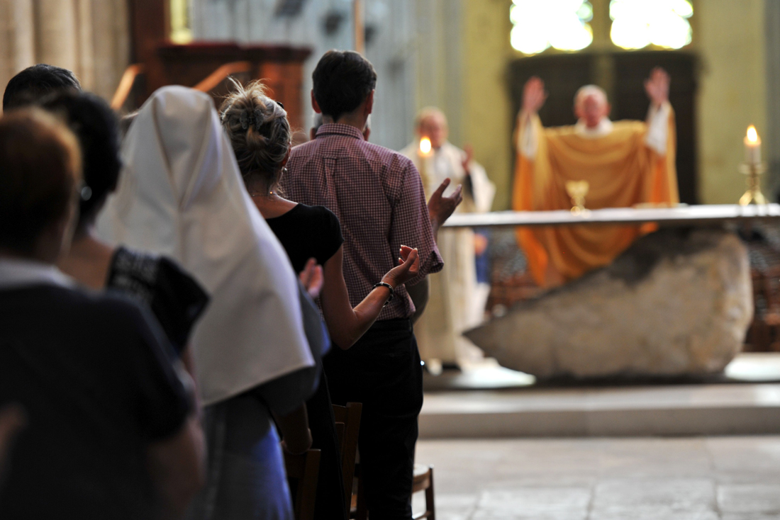 believers pray on july 26 2016 in tours 039 cathedral central france during a mass in tribute to the priest killed in saint etienne du rouvray in the latest of a string of attacks against western targets claimed by or blamed on the islamic state jihadist group photo afp