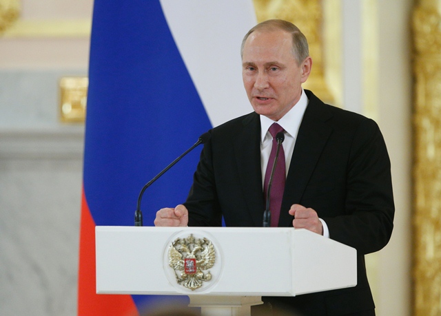 russian president vladimir putin gives a speech during a meeting with members of the country 039 s olympic team at the kremlin in moscow on july 27 2016 president vladimir putin on july 27 said the absence of some russian stars at the rio games would hit the quality of the competition photo afp