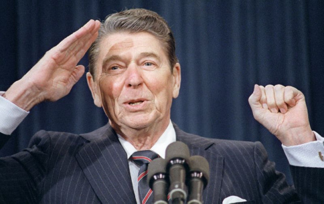 late us president ronald reagan salutes as he tells a joke during his address to the leadership of the american legion february 1987 at the white house in washington dc photo afp late us president ronald reagan salutes as he tells a joke during his address to the leadership of the american legion february 1987 at the white house in washington dc photo afp