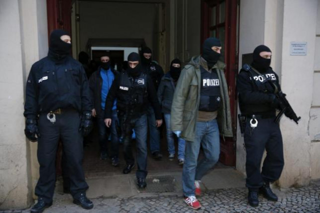 german special police units leave an apartment building in the wedding district in berlin photo reuters