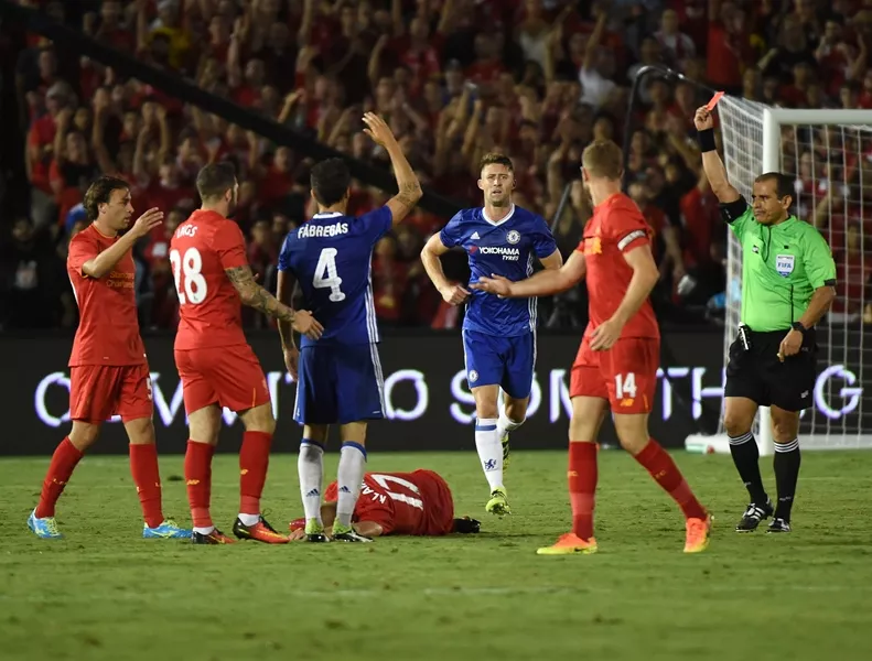 cesc fabregas receives a red card after fouling ragnar klavan at the rose bowl stadium in pasadena california on july 27 2016 photo afp cesc fabregas receives a red card after fouling ragnar klavan at the rose bowl stadium in pasadena california on july 27 2016 photo afp