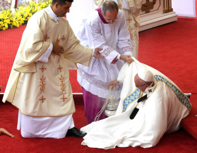 pope francis falls down during poland visit remains unharmed