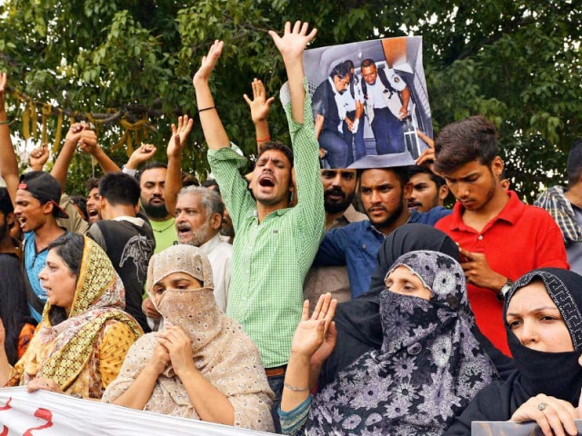 relatives and neighbours of zulfiqar ali who was sentenced to death in indonesia protest in lahore photo afp relatives and neighbours of zulfiqar ali who was sentenced to death in indonesia protest in lahore photo afp