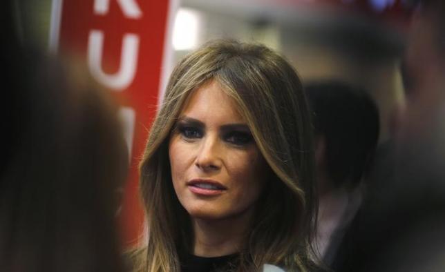 republican us presidential candidate businessman donald trump waits to come into the spin room with his wife melania photo reuters