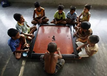 orphans play carom at an orphanage in the eastern indian city of kolkata may 29 photo reuters orphans play carom at an orphanage in the eastern indian city of kolkata may 29 photo reuters