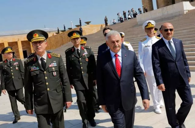 turkey 039 s prime minister binali yildirim c flanked by chief of staff general hulusi akar l defense minister fikri isik r and the country 039 s top generals leaves anitkabir the mausoleum of modern turkey 039 s founder mustafa kemal ataturk after a wreath laying ceremony ahead of a high military council meeting in ankara turkey july 28 2016 photo reuters turkey 039 s prime minister binali yildirim c flanked by chief of staff general hulusi akar l defense minister fikri isik r and the country 039 s top generals leaves anitkabir the mausoleum of modern turkey 039 s founder mustafa kemal ataturk after a wreath laying ceremony ahead of a high military council meeting in ankara turkey july 28 2016 photo reuters