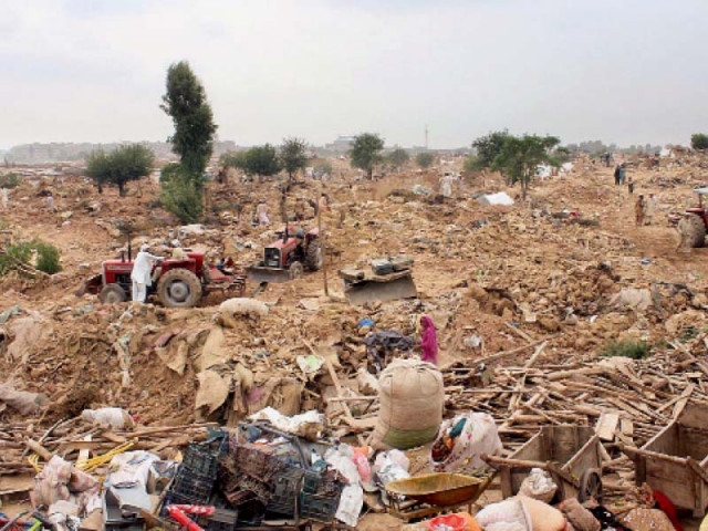 the remains of afghan basti after last year s razing exercise photo file
