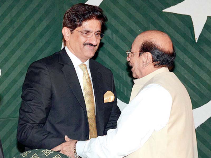qaim ali shah embraces new sindh cm murad ali shah after the oath taking ceremony photo app
