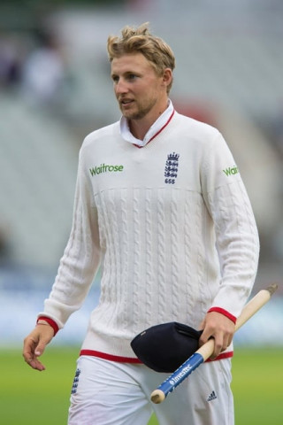 england 039 s joe root carries a stump as he leaves the pitch after his team 039 s 330 run win against pakistan on the fourth day of the second test at old trafford cricket ground in manchester on july 25 2016 england won the match by 330 runs photo afp england 039 s joe root carries a stump as he leaves the pitch after his team 039 s 330 run win against pakistan on the fourth day of the second test at old trafford cricket ground in manchester on july 25 2016 england won the match by 330 runs photo afp